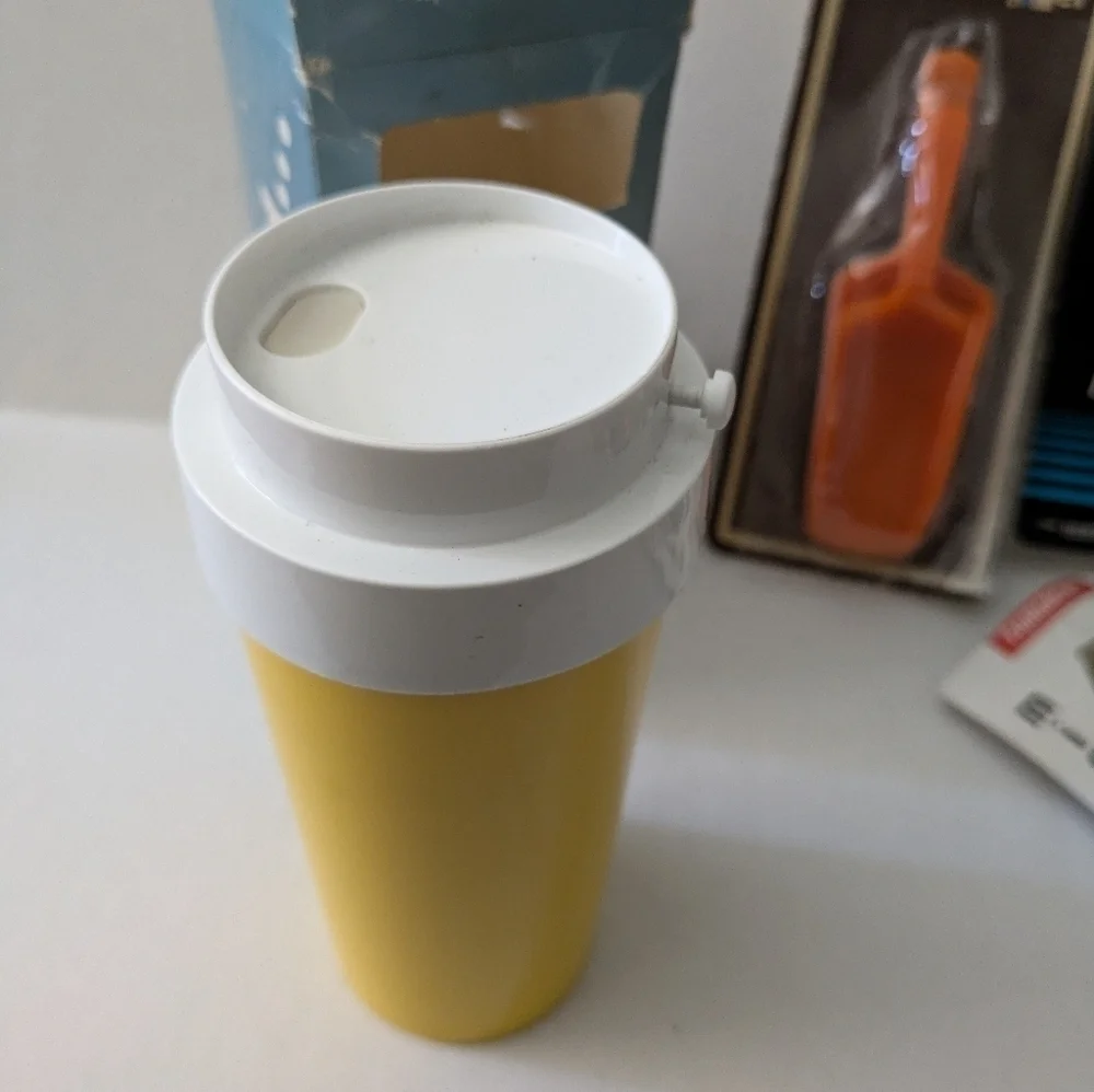 Vintage New Old Stock kitchen gadgets, cup, pitcher,etc.